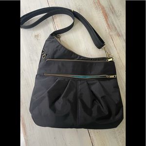 Travelon side body bag - like new Black/turquoise interior